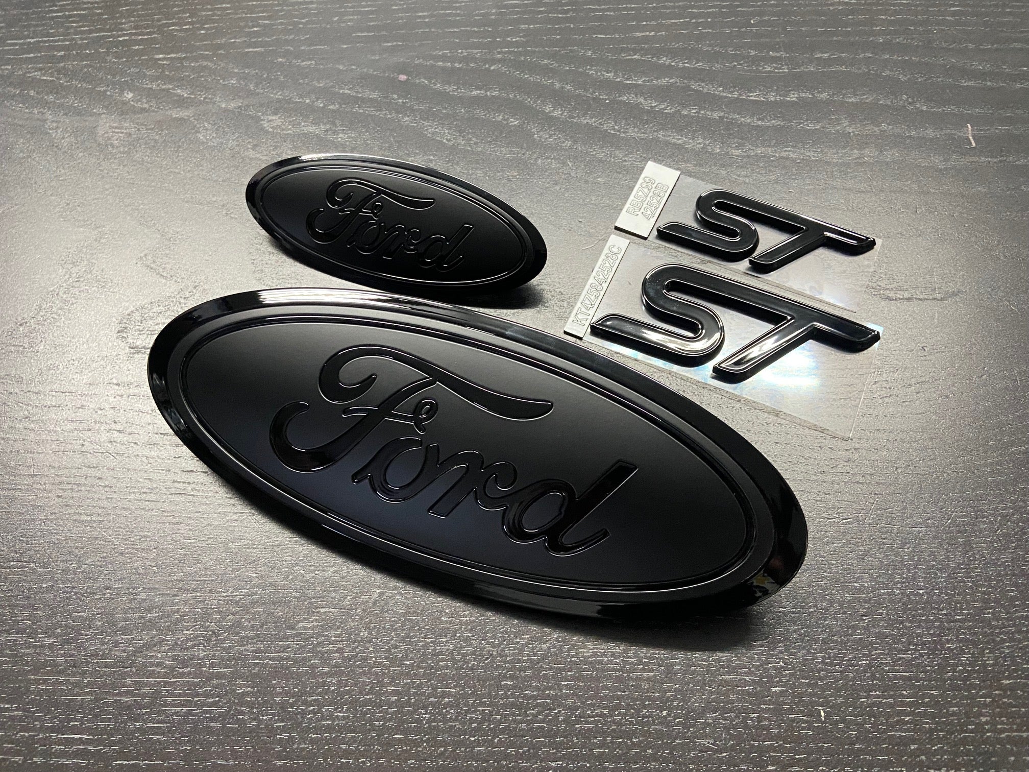 Matte Black Rear Emblem Badge For Ford Fusion SE - Direct Replacement DS7Z-9942528-B